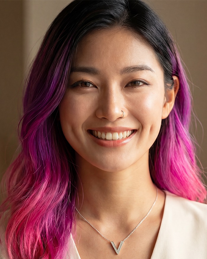 Vela smiling — dimples visible